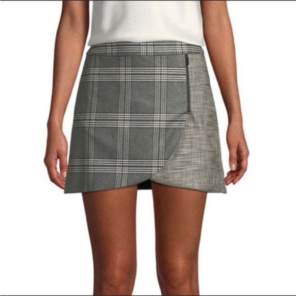 Alice + Olivia Dresses & Skirts - Alice and Olivia black, grey and white gingham mini skirt w/ silver undertones.